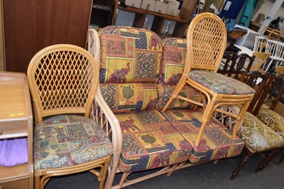 Lot 784 - A bamboo framed conservatory sofa and two...