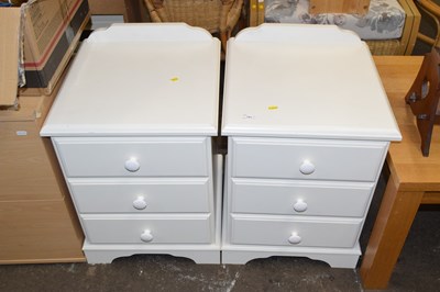 Lot 791 - A pair of white painted bedside cabinets
