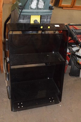 Lot 808 - A tinted perspex shelf unit