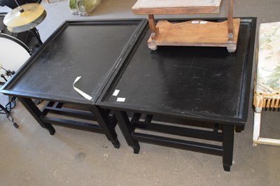 Lot 812 - A pair of modern dark finish coffee tables