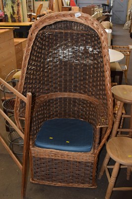 Lot 828 - A wicker work cocoon type chair