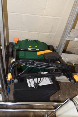 Lot 866 - An electric lawn raker and scarifier