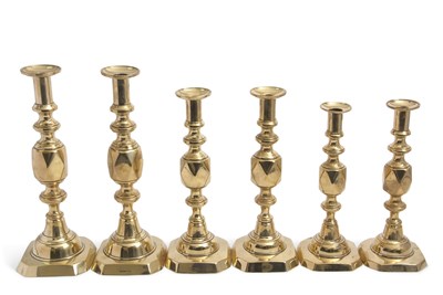 Lot 455 - A graduated set of three pairs of brass...