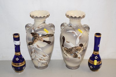 Lot 11 - Pair of blue glass vases with gilt floral...