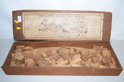 Lot 24 - A quantity of wooden building blocks with...