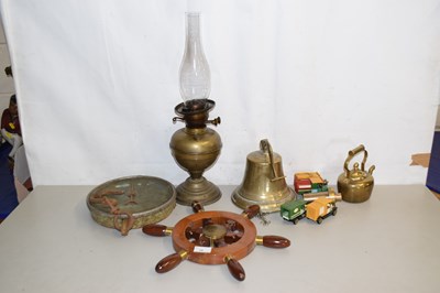 Lot 28 - A wooden and brass model of a ships wheel...
