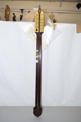 Lot 50 - A stick barometer with painted wooden scale