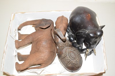 Lot 64 - Box containing carved wooden elephants, one...