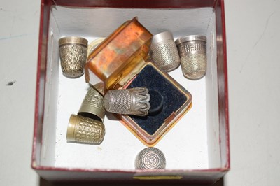 Lot 126 - Box containing small quantity of thimbles