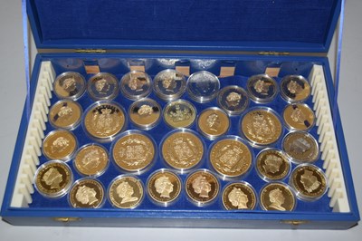 Lot 130 - Box containing a quantity of encapsulated gilt...