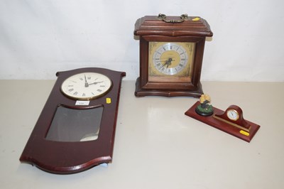 Lot 159 - A modern wall clock together with a mantel...