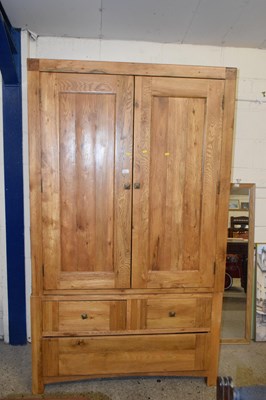 Lot 254 - A  modern oak double door wardrobe with three...