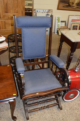 Lot 302 - An American design spring loaded rocking chair