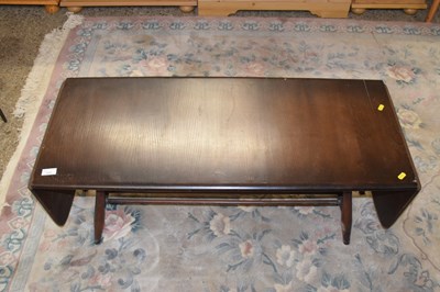 Lot 325 - A dark Ercol drop leaf coffee table