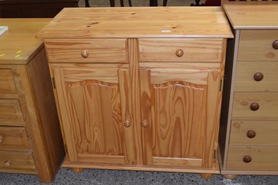 Lot 332 - A modern pine two door two drawer sideboard