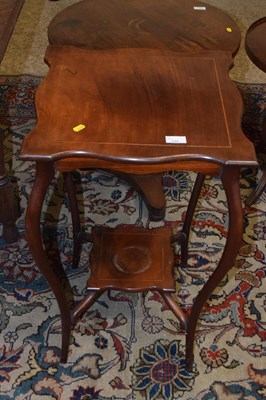 Lot 349 - An Edwardian two tier lamp table