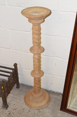 Lot 359 - A torchere plant stand with barley twist column