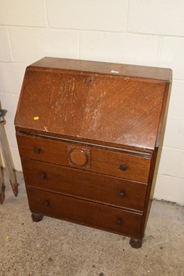 Lot 363 - A vintage oak bureau