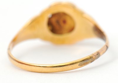 Lot 8 - A garnet and seed pearl ring, the central...