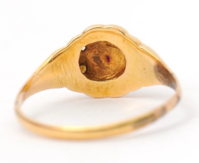 Lot 8 - A garnet and seed pearl ring, the central...