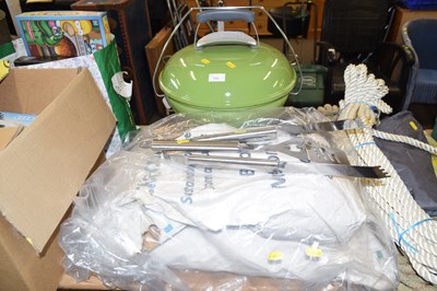 Lot 755 - A barbecue with tools and charcoal