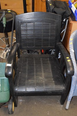 Lot 793 - A black painted armchair
