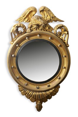 Lot 492 - Regency Eagle-mounted carved gilt wood convex...