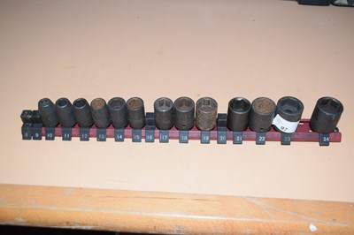 Lot 97 - A rack containing stubby impact sockets to...