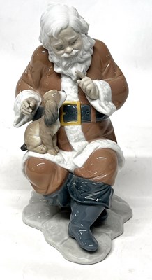 Lot 325 - Lladro Figurine: Santa's Little Secret from Santa's Magical Workshop Series