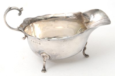 Lot 71 - A George V silver sauce boat of typical form...