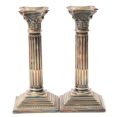 Lot 1 - A pair of Elizabeth II silver candlesticks...