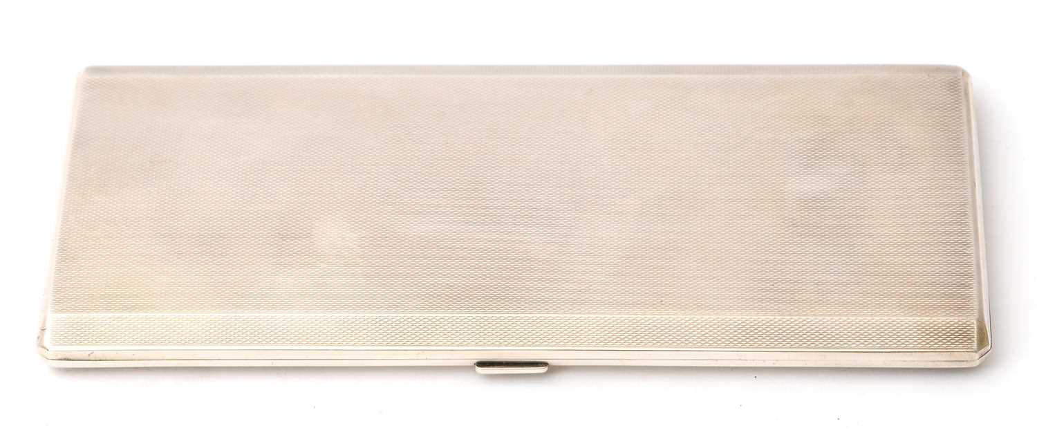 Lot 2 - A large hallmarked silver cigarette case of...