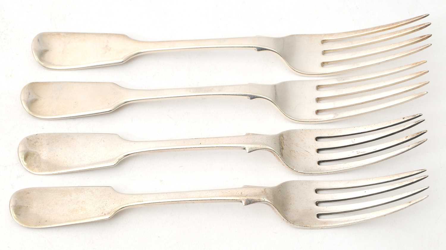 Lot 86 - A group of four Victorian fiddle pattern forks,...