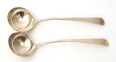 Lot 85 - A pair of George III silver sauce ladles,...