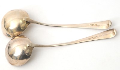 Lot 85 - A pair of George III silver sauce ladles,...