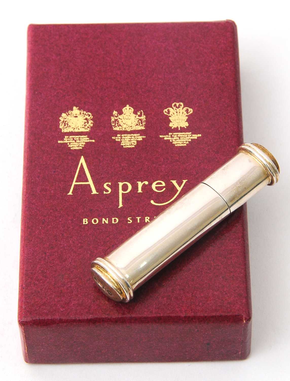 Lot 5 - An Elizabeth II Asprey's silver tooth pick...