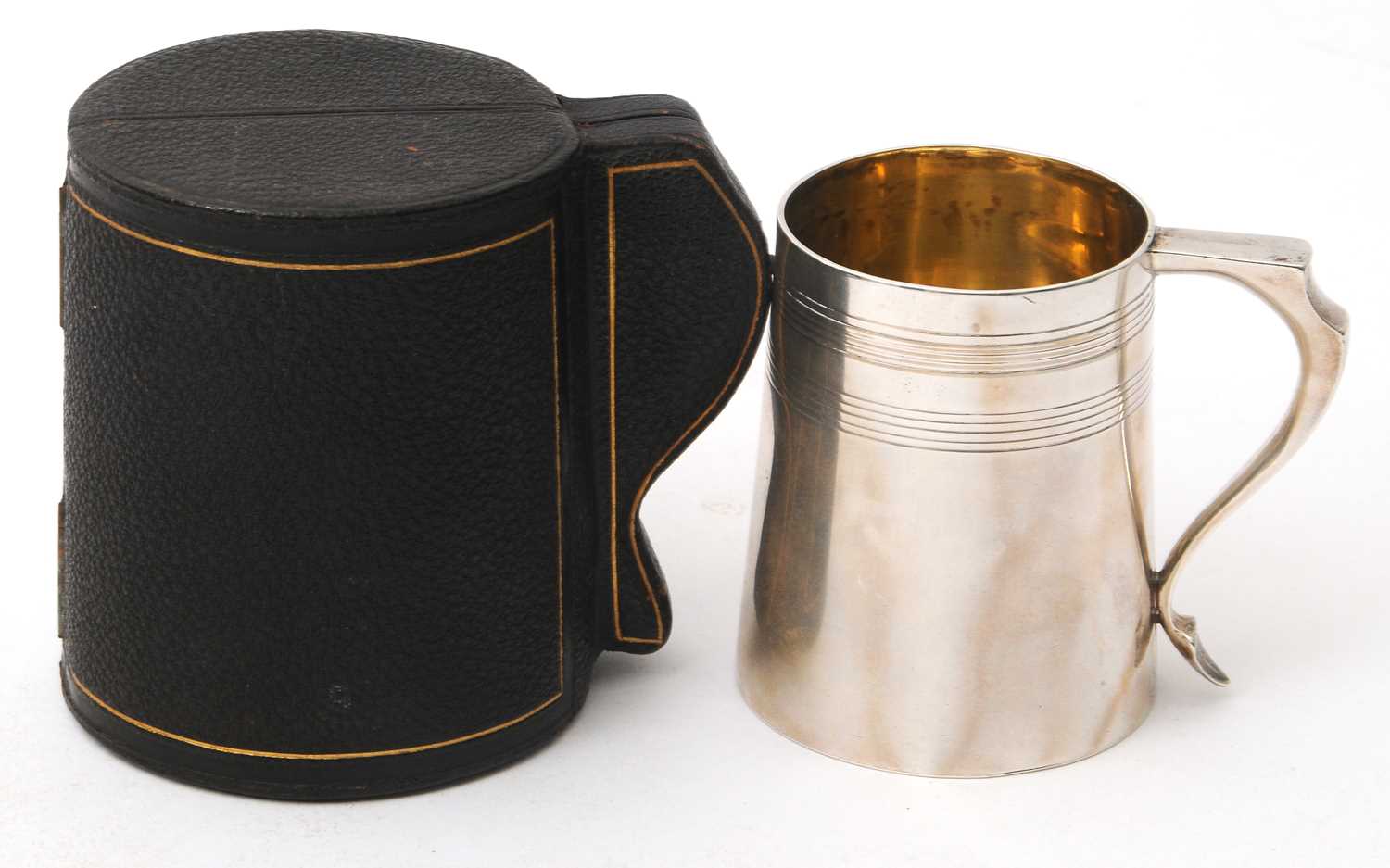 Lot 9 - A late 19th Century silver christening tankard...