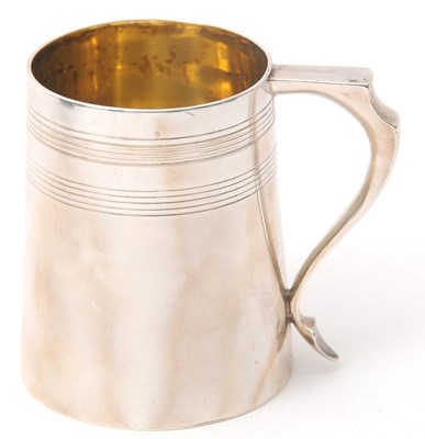 Lot 9 - A late 19th Century silver christening tankard...