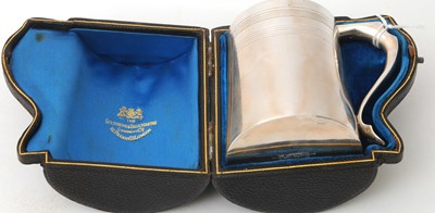 Lot 9 - A late 19th Century silver christening tankard...