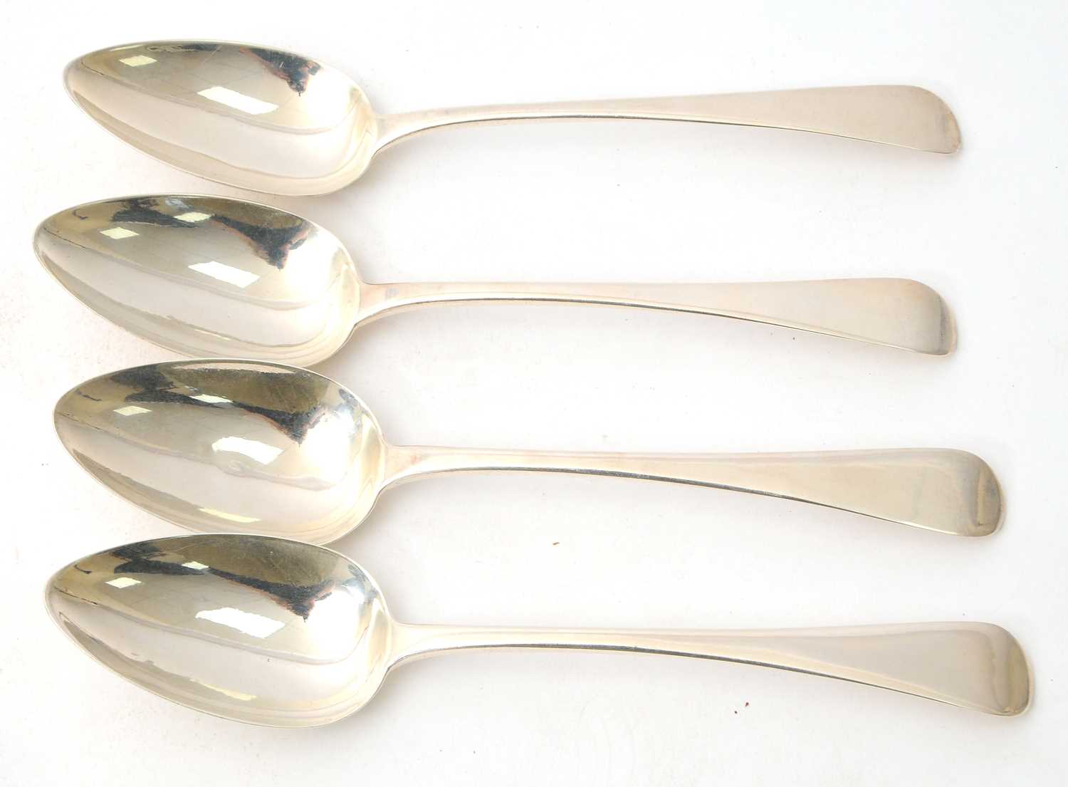 Lot 15 - A group of four George IV silver serving...