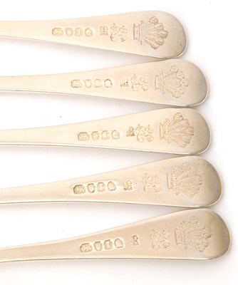 Lot 18 - A group of five George III silver table forks,...