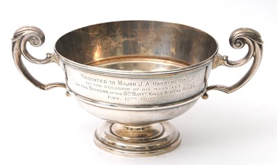 Lot 27 - An Edwardian silver twin handled trophy of...
