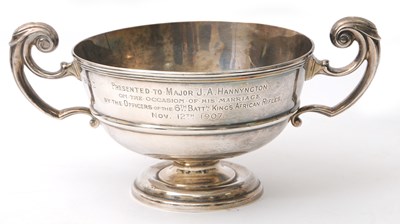 Lot 27 - An Edwardian silver twin handled trophy of...