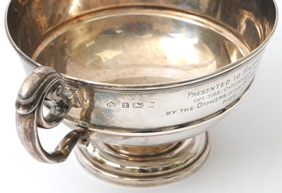 Lot 27 - An Edwardian silver twin handled trophy of...