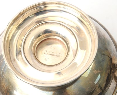 Lot 27 - An Edwardian silver twin handled trophy of...