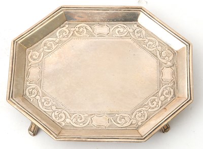 Lot 29 - A George III silver teapot stand of octagonal...