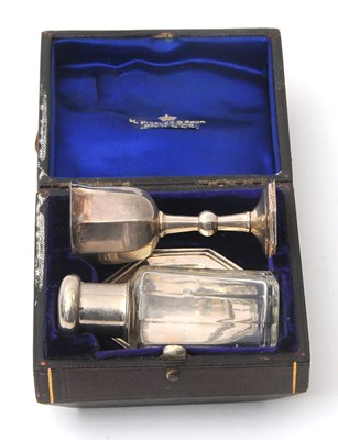 Lot 32 - A silver travelling communion set in fitted...