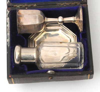 Lot 32 - A silver travelling communion set in fitted...