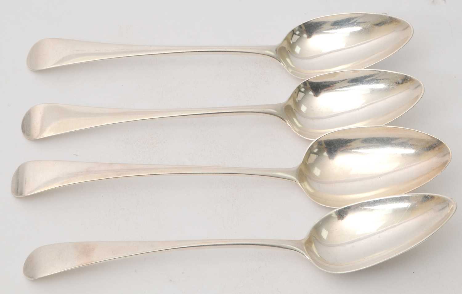 Lot 37 - A group of four Georgian silver serving spoons...