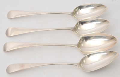 Lot 37 - A group of four Georgian silver serving spoons...